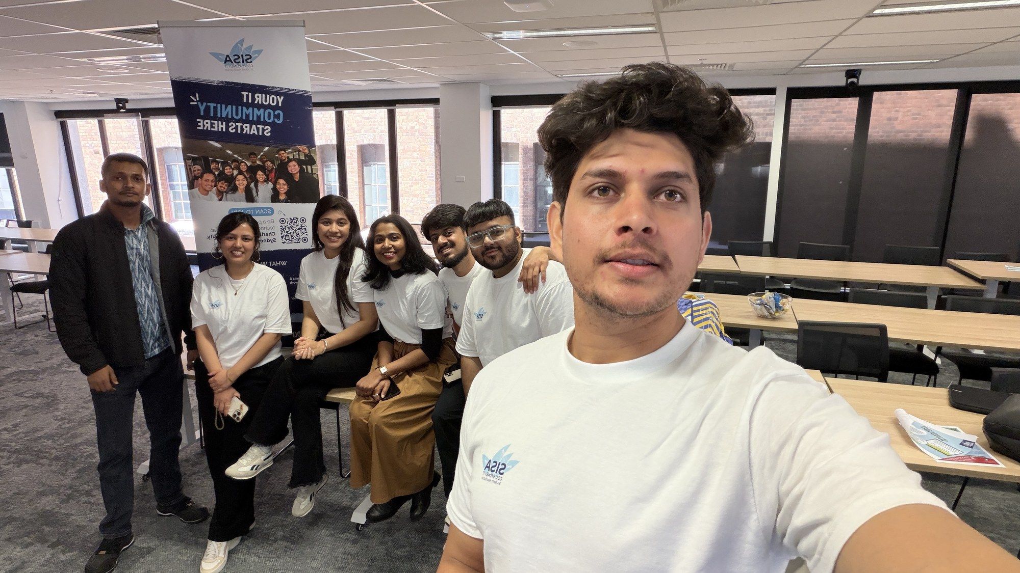 Manish with SISA members at the elections information session.